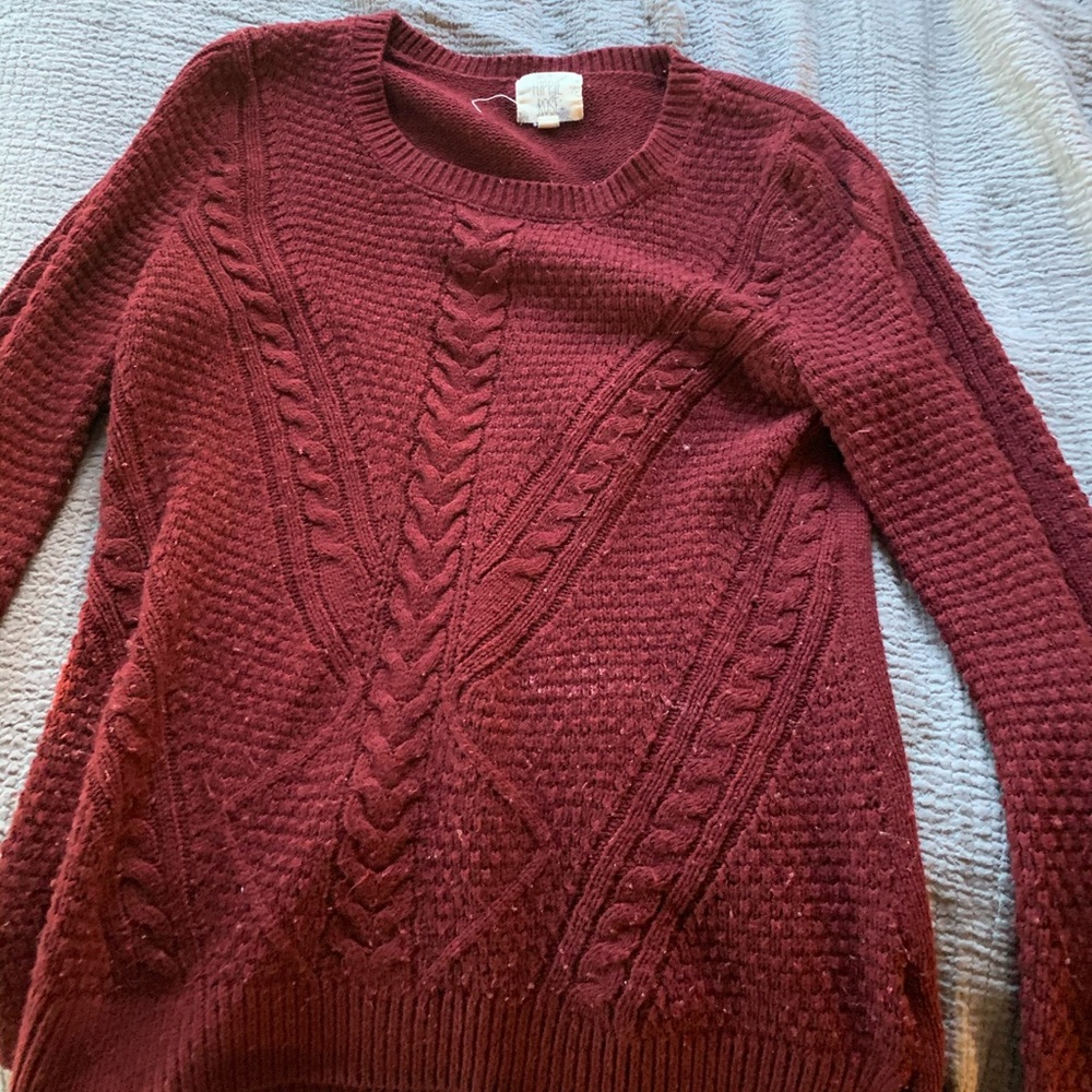 Red sweater in good condition